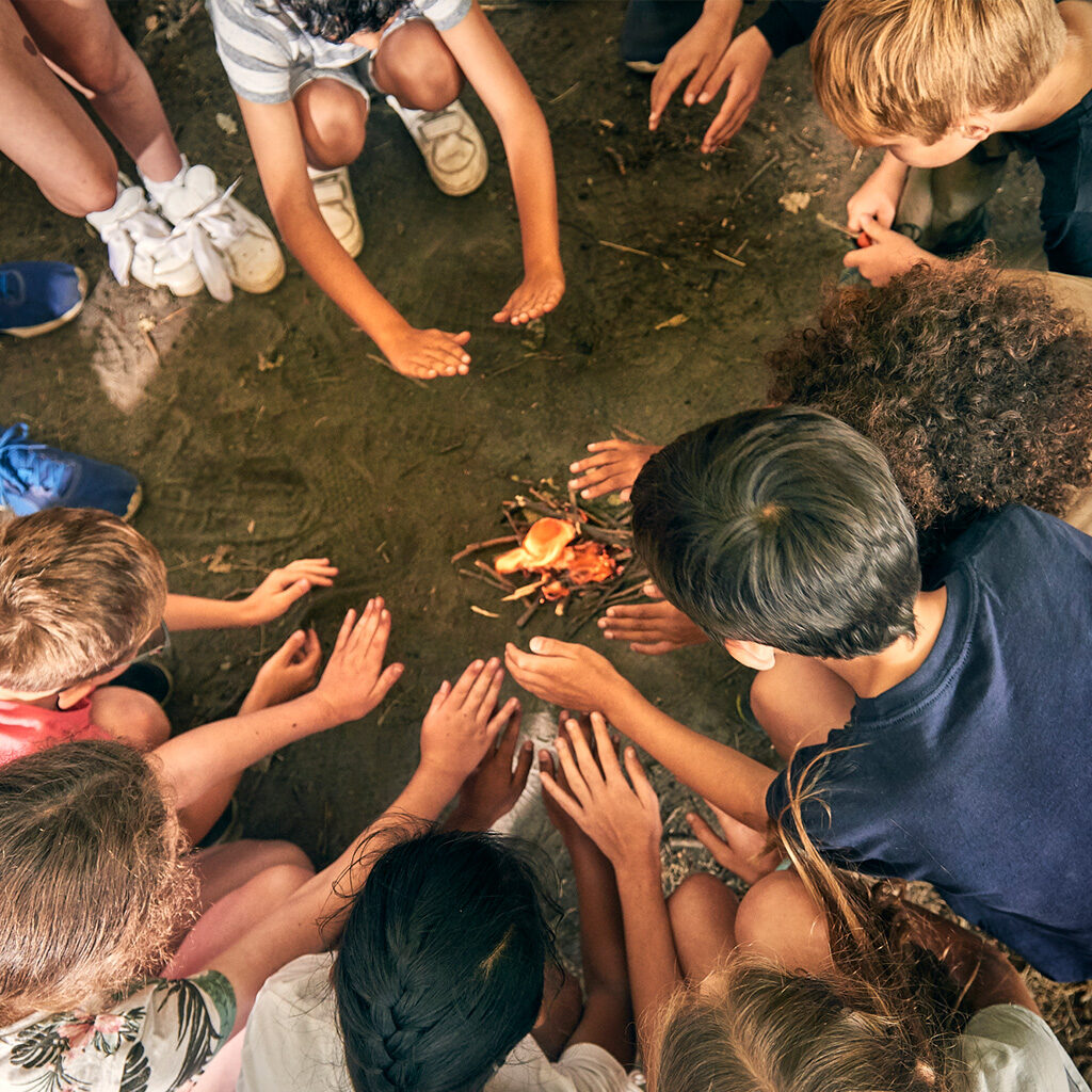 School holiday club around the camp fire